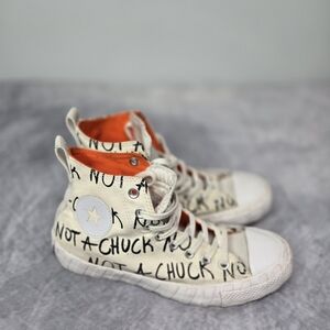 Converse Chuck 70 Hi "UNT1TL3D" in the "White/Not a Chuck" colorway